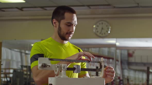 Disabled Athlete Measuring Weight