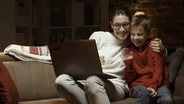 Mother and son video calling on Christmas eve