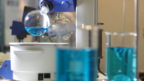 Blue Liquid In Flasks alt