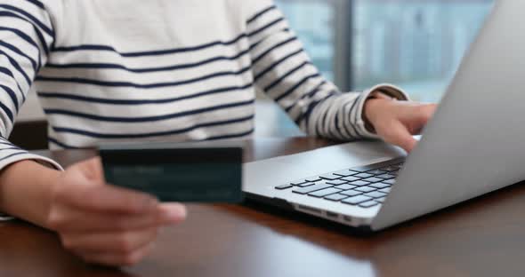 Woman use of laptop computer for online shopping