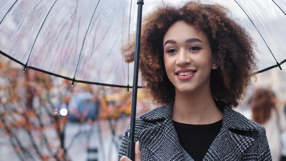 African American Girl Beautiful 20s Lady with Curly Hair Female Model Standing on Street City Autumn