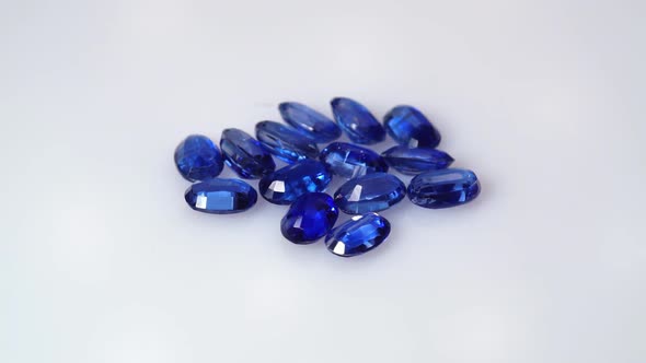 Natural Kyanite Gemstone on the White Background on the Turning Table