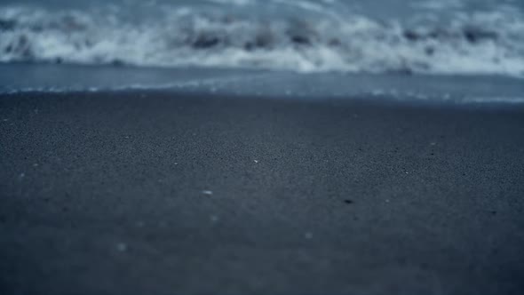 White Wave Crashing Beach Sand