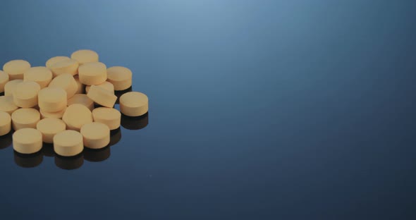 Prescription drugs - Capsules, pills, tablets on reflective background