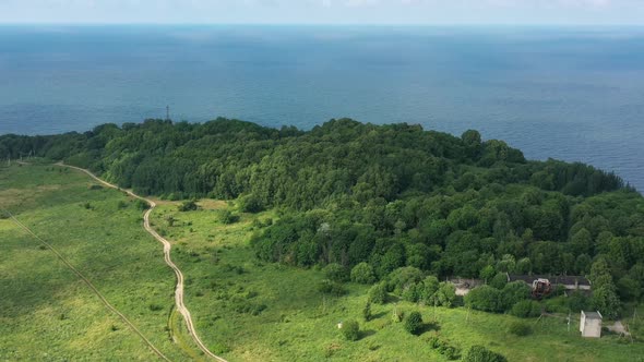 Baltic Coastline with Green Summer Forest and the Sea