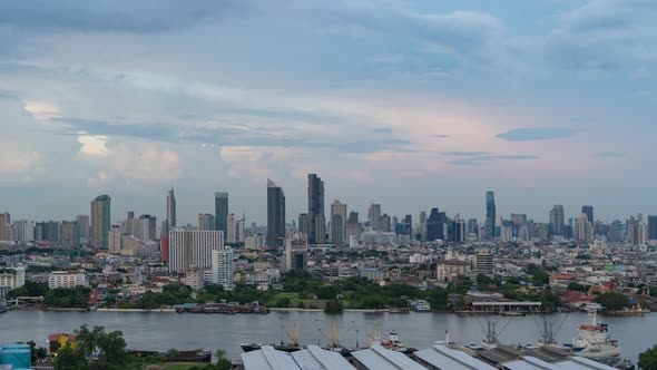 Time lapse of aerial view of Bangkok Downtown Skyline with Chao Phraya River. Thailand