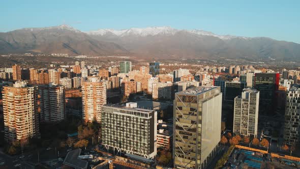 Panoramic Cityscape Of Las Condes In Santiago, Chile With Picturesque View Of The Andes Mountain Ran