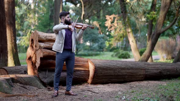 Solo Concert of Male Violinist in Forest Talented Musician is Playing Classical Melody in Nature