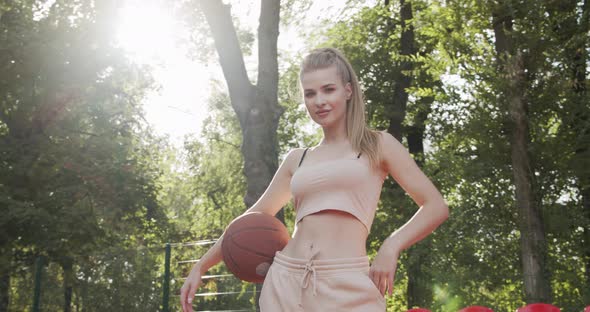 Basketball girl with a ball