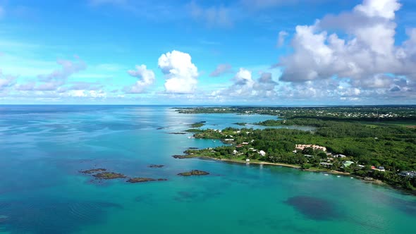 Clouds in blue sky over bay at Cap Malheureux, Mauritius