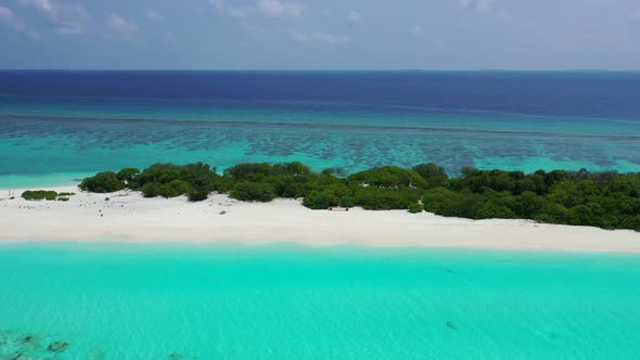 Aerial drone view sky of tropical lagoon beach voyage by aqua blue water with clean sand background 