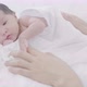 Mother take care her adorable newborn baby carefully with love. - VideoHive Item for Sale