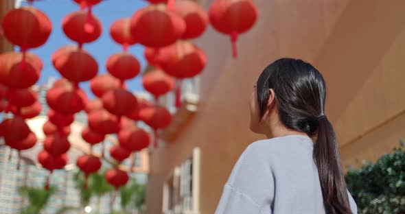 Woman look at the red lantern