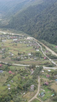 Vertical Video Village in the Carpathian Mountains in Autumn