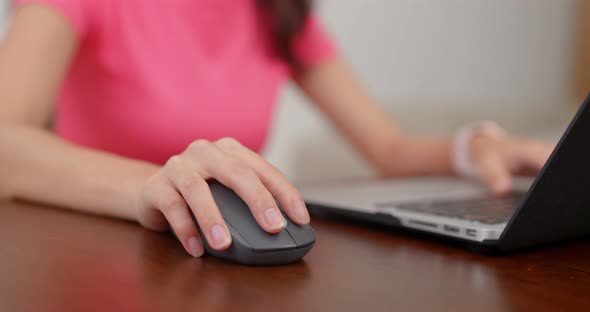 Woman work on computer at home