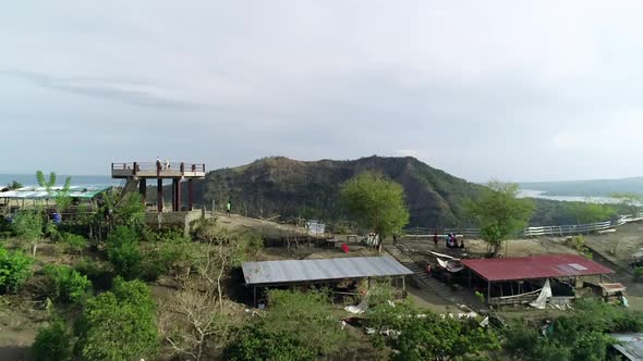 Aerial view of observation point of tall volcanic lake in Talisay, Philippines.