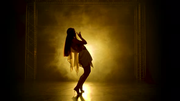 Enchanting Girl in Greek Greece Goddes Dress and Wreath High Fashion Demonstrating the Flexibility