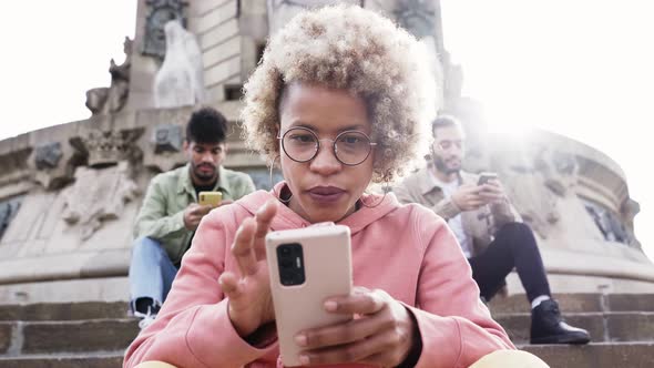 Group of People Using Phone with Serious Face and Ignoring Each Other