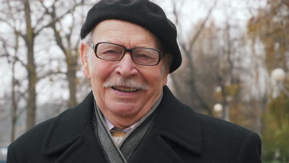 Portrait of senior male looking straight to camera