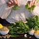 The process of making pesto sauce at home. A woman plucks leaves from a basil branch - VideoHive Item for Sale