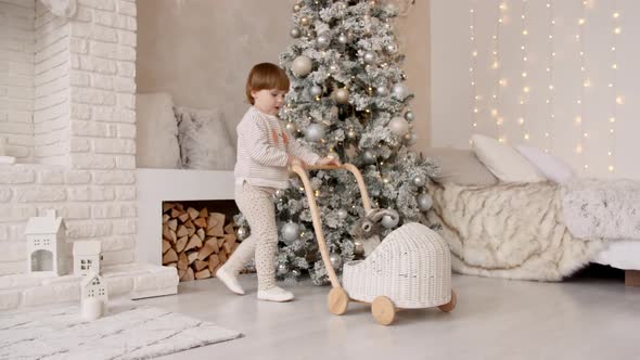 The Child Plays in the New Year's Interior