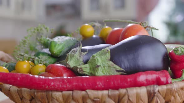 Basket Of Vegetables Is On the Table In Kitchen