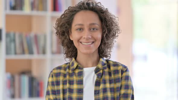 Portrait of Mixed Race Woman Smiling at Camera