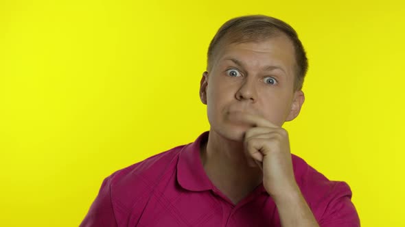 Portrait of Man Posing in Pink T-shirt. Crazy Handsome Guy Making Funny Faces, Play with His Lips