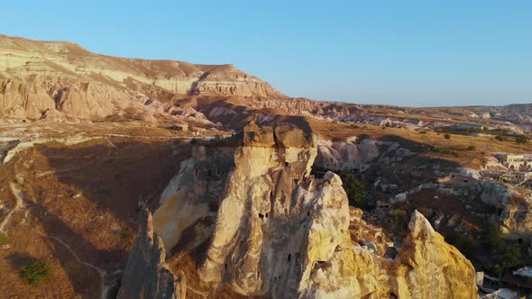 Sunset Aerial Drone View of Cavusin Cave Fortress in Cappadocia