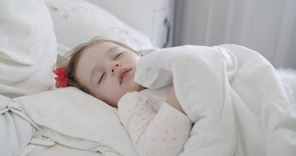 Closeup Portrait of an Adorable Oneyearold Girl Sleeping Peacefully