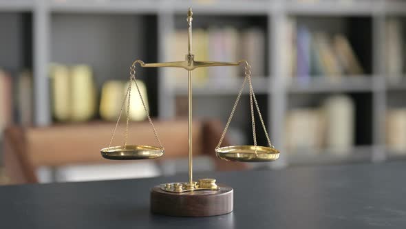 Gold Brass Balance Scale on Lawyer Office Table