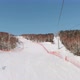 Riding on Ski Lift Above the Slopes in the Morning - VideoHive Item for Sale