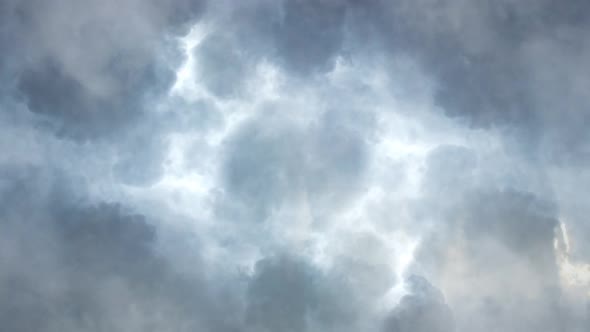 a thunderstorm in the dark  sky, a moving cumulonimbus cloud