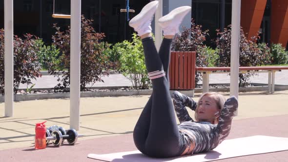 Woman's outdoor workout in summer
