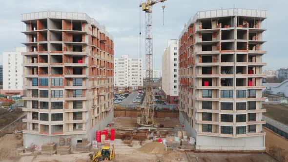 Aerial View of the Construction Site of Residential Buildings in the Middle of the Day