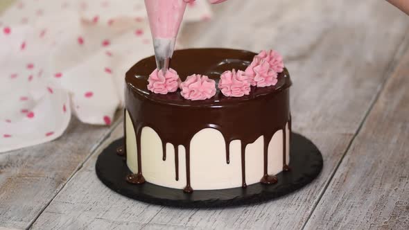 The Pastry Chef Prepares and Decorates the Cake at Home