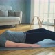 Woman in Sportswear Does Crunches and Leg Lifts in Room - VideoHive Item for Sale
