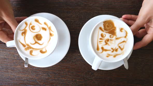 Serving Coffee With Latte Art On Foam In Coffee Shop