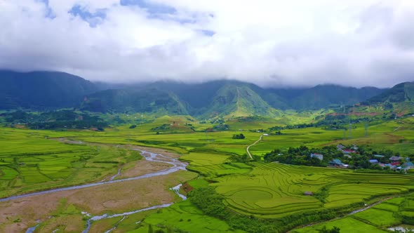 Aerial top view of Fansipan mountains with paddy rice terraces in Sapa, Vietnam.