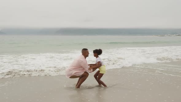 Family enjoying free time by the sea