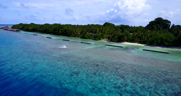 Wide angle fly over abstract view of a paradise sunny white sand beach and blue sea background in hi