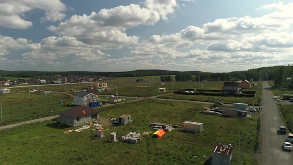 Aerial view of Start of construction in a new cottage settlement 03