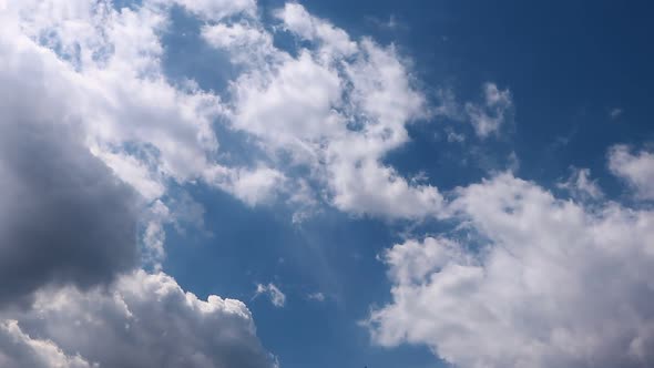 Timelapse summer clouds on blue sky