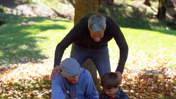 three generations of men outdoors