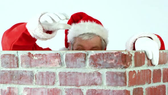 Santa claus climbing up a chimney