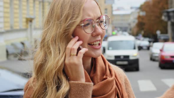 Closeup Emotional Young Millennial Girl Talking on Telephone Outdoor Caucasian Female Enjoys