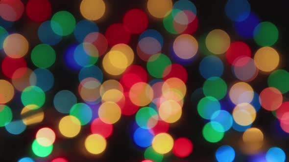 Multicolored Lights on a Black Background Blinking Copy Space