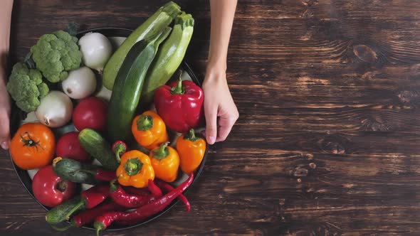 Invisible Person Arms Holds Salver with Veggies.