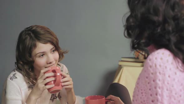 Wonderful Family of Mother and Daughter Spending Evening in Cozy Atmosphere