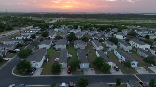 Arizona trailer park community during sunset. Hispanic Latino community housing. Aerial view.